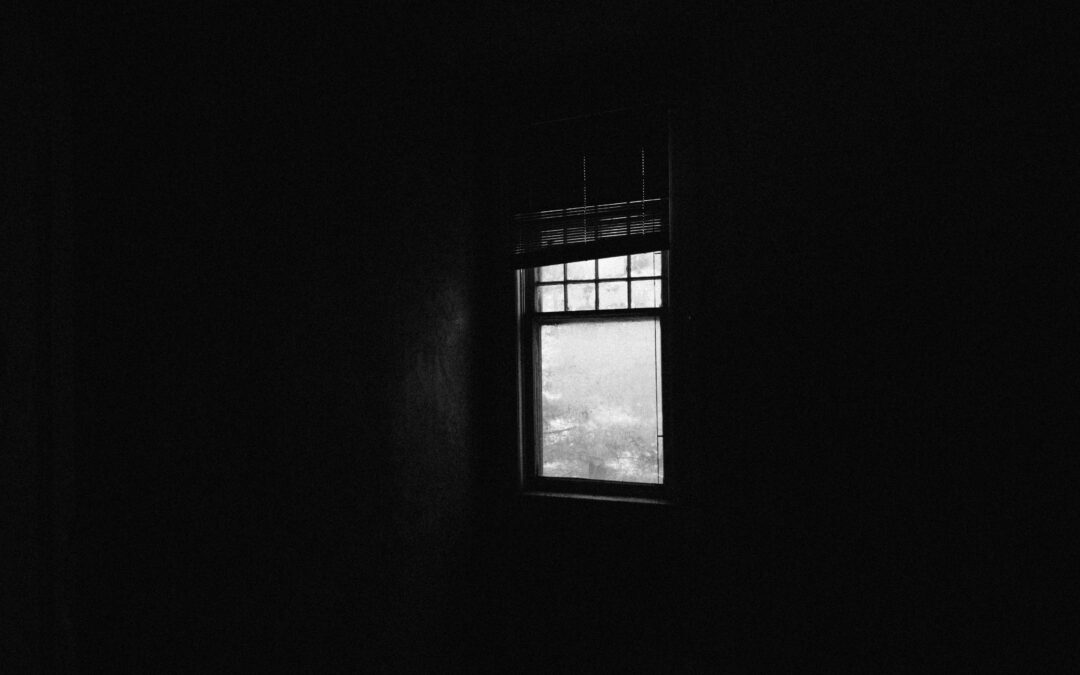 The faint light of a distant window in a dark room. What do we do when experiencing darkness in our lives?